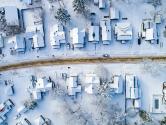 Aerial of village main street in winter