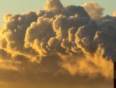 Air pollution clouds from factory chimney