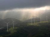 Sunbreak at wind turbines after storm