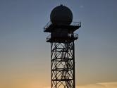 Weather radar with sunset in the background