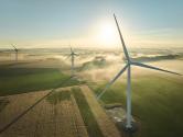 Aerial view of wind turbines in a field