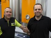 Entrepreneur Markus Wickholm from MaWi Automation Oy and Antti Heikkilä, Technical Manager from Eino Korhonen Oy, holding Vaisala’s DMT143 dew point transmitter.