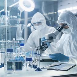 Life science researchers in a cleanroom laboratory