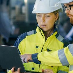 Man and woman in factory environment