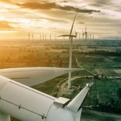 closeup of wind turbine at sunset