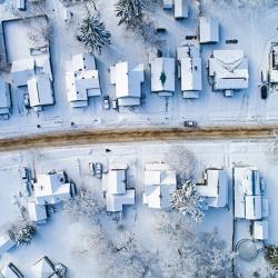 Aerial of village main street in winter