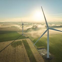 Aerial view of wind turbines in a field