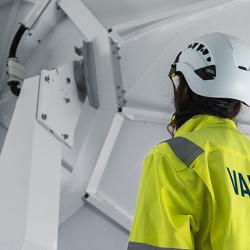 Inside Vaisala weather radar with technician.