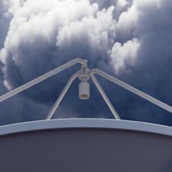 X-band radar antenna below a storm cloud