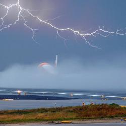 Plane taking off in a thunderstorm